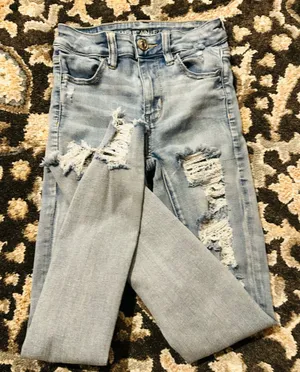 American Eagle Next Level Stretch Super Distressed Jeans size 0 thumbnail 3