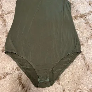 Olive Green V-Neck Bodysuit by BKE Red size large thumbnail 2