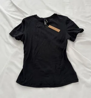 skims cotton jersey tshirt Size small Condition: NWT Color: soot Details thumbnail 3