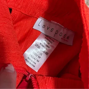 Boutique NWOT Red Sleeveless Zip Tank Top thumbnail 4