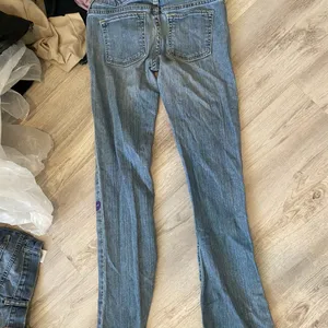 hand painted logo graphic jeans thumbnail 5