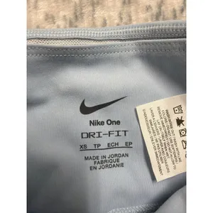 Nike‎ One Womens High Rise 8 Inch Biker Shorts Light Blue FZ6758-440 XS…. thumbnail 2