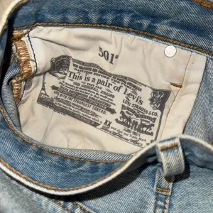 Levi's 501 distressed denim shorts size 29  thumbnail 4