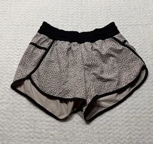 Lululemon Choose a Side Reversible Shorts Tan Black Animal Print Size 8 thumbnail 1