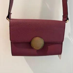 NWT Charles &‎ Keith Burgundy Circular Push Lock Crossbody Bag thumbnail 3