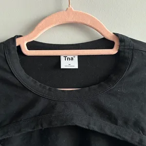 aritzia black long sleeve cut out crop top thumbnail 2