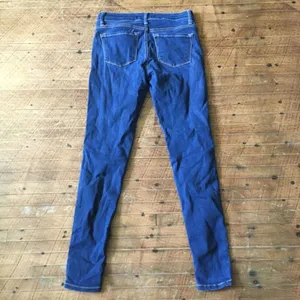 Kancan medium wash mid rise size 27 skinny jeans thumbnail 3