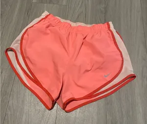 Nike Women's Coral and White Athletic Shorts thumbnail 1