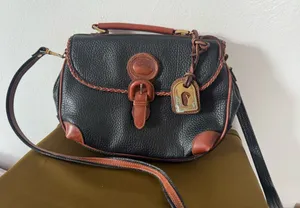Vintage Dooney & Bourke Black pebble with brown Leather cross body bag thumbnail 1