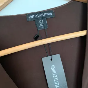 Pretty Little Thing Brown Long Sleeve Ruched Cut Out Maxi Dress thumbnail 8