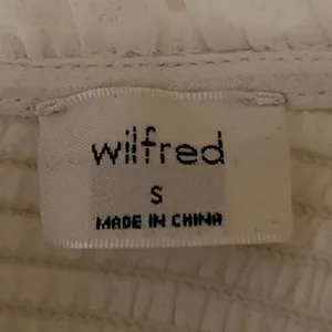 Aritzia Wilfred Women's White Puff Sleeve Smocked Ruffle Peplum Sweater Top Sz S thumbnail 3