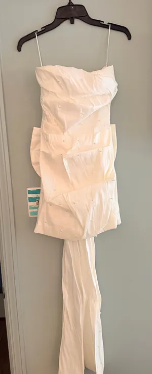 Small, short, white, pearl bow dress thumbnail 1