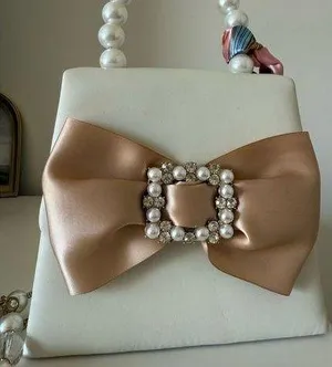 White Purse with Champagne Bow and Pearls thumbnail 1