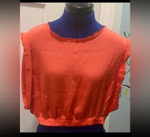 Free People pull over top in a size large thumbnail 1