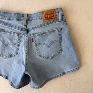 Levi's A-Line High Rise Denim Shorts Women 28 Light Wash Blue thumbnail 2
