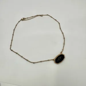 Black and gold tone pendant necklace thumbnail 4