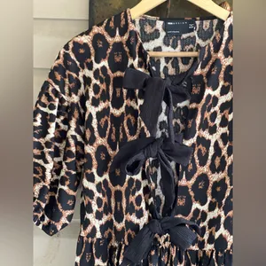 ASOS DESIGN puff sleeve tie front maxi dress in leopard print thumbnail 7