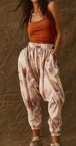 Free People Movement NWOT All Strapped Printed One Piece Harem Jumpsuit XS thumbnail 1