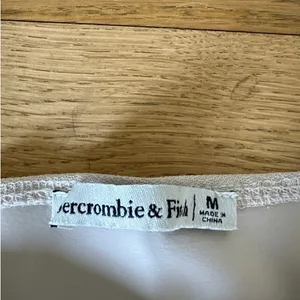Abercrombie & Fitch - Long Mesh Sleeve Corset Style Bodysuit in Beige thumbnail 3