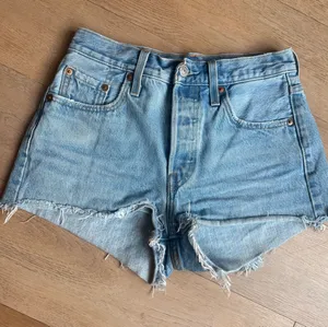 Levi's 501 blue denim shorts thumbnail 1