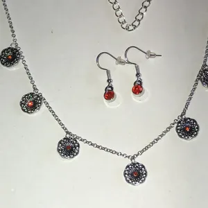 Silver Tone Floral Disc Necklace & Orange Accent Earrings Set thumbnail 3