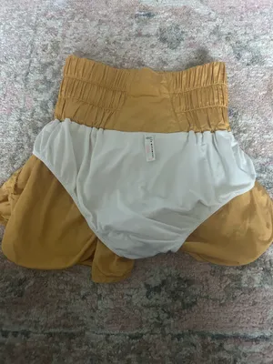 Yellow gold free people movement shorts thumbnail 5