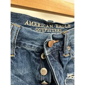 American Eagle Vintage Hi-Rise Festival Blue Distressed Denim Shorts‎ Size 2 thumbnail 5