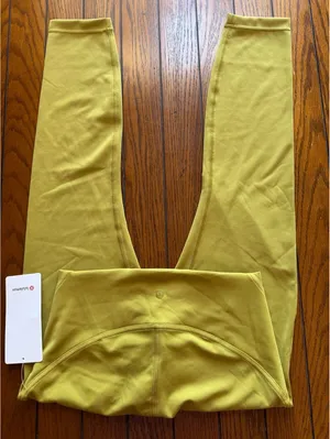 Lululemon Instill High Rise 25” Auric Gold Size 8 NWT thumbnail 1
