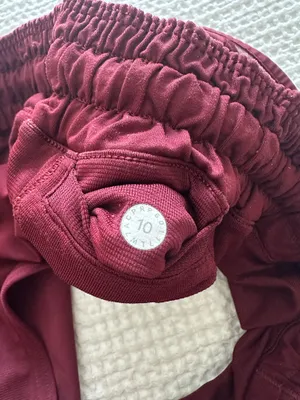  Lululemon maroon lined drawstring shorts with reflective striped sides   thumbnail 3