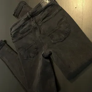 American Eagle Next Level Stretch High Rise Jeggings Black Size‎ 4 Long thumbnail 6
