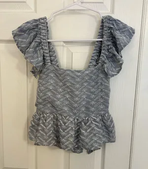 Francesca's Top Crop Blue Eyelet flutter sleeve tie back thumbnail 1