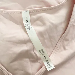 Lululemon Women's Nulu Cropped Slim Yoga Short Sleeve Tee Shirt Pink Mist 12 thumbnail 2