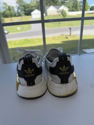 adidas boost White Athletic Sneakers with Black Stripes and Gold Accents thumbnail 2