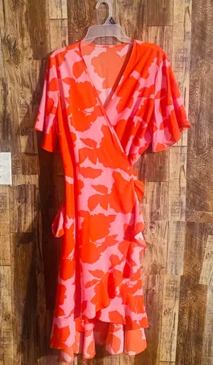 Plus size casual dress women's floral print short sleeve surplice neck ruffle trim asymmetrical hem wrap dress. Orange size 1xl. Like new thumbnail 1