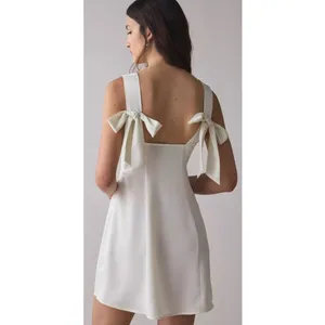 Urban Outfitters🤍 Bri Double Bow Satin White Mini Dress - Size XS Women’s thumbnail 2