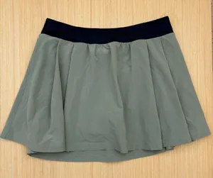 Beyond Yoga two-tone pleated skirt in sage green and navy size S small thumbnail 1