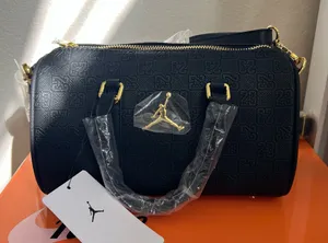 NWT NIKE Jordan Monogram Leather Mini Duffel (3L) thumbnail 1
