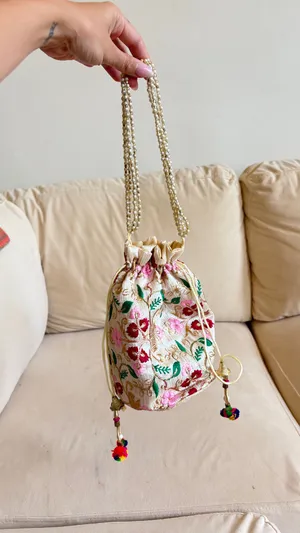 Handmade embroidered floral drawstring bag with pink, red, and green flowers and gold accents. #handmade #embroidered thumbnail 2