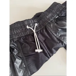 NIKE Sportswear Black Elastic Drawstring Waist Rebel cargo pants EUC thumbnail 6