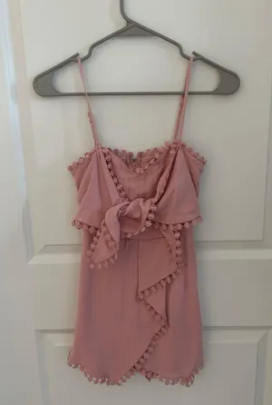 Francesca's Pink Ruffle Wrap Romper thumbnail 1