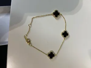 Black and gold clover necklace, bracelet and earrings set thumbnail 2