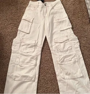White Lioness denim cargo pants with a relaxed fit. New with tags #cargopants #trendy #cute #summer #style thumbnail 1
