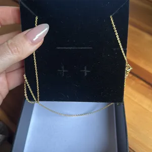Gold Flame Pendant Necklace thumbnail 2