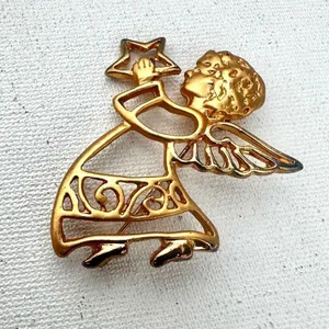 Gold tone angel holding star brooch thumbnail 2