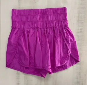 FREE PEOPLE MOVEMENT the way home smocked shorts workout pink M travel thumbnail 1