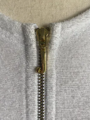 JUICY COUTURE-WHITE ZIP FRONT HOODIE-WOMENS SIZE SMALL Cozy white hooded zip-up jacket with drawstrings. Perfect for casual wear, 3/4 sleeves, gold hardware, J zipper pull, 100% cotton, has stretch, excellent condition Measurements: Bust: armpit to armpit 23-25 inches Length: shoulder seam to bottom 20 inches thumbnail 4