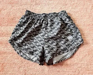 Nike Women’s M Dri-FIT Tempo Running Shorts Black Gray Print thumbnail 1