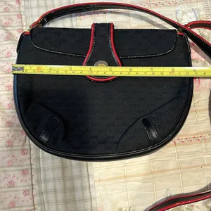 Gucci vintage crossbody bag black with red trim. Beautiful inside has wear shown thumbnail 8
