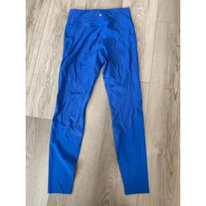 Halara SoftlyZero SoCinched Tummy Control Perforated 7/8 Leggings Beau Blue S thumbnail 4