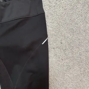 Athleta Women’s Black Running Leggings with a Reflective Details thumbnail 2
